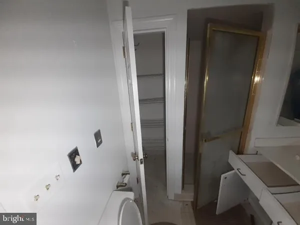 a bathroom with a double vanity sink and mirror