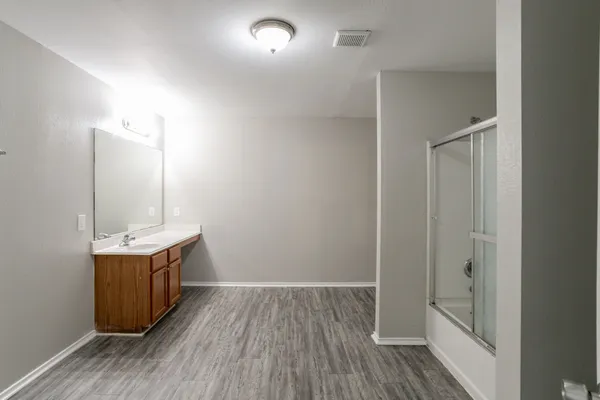 a view of an empty walk in closet