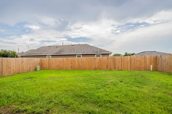 front view of house with a yard