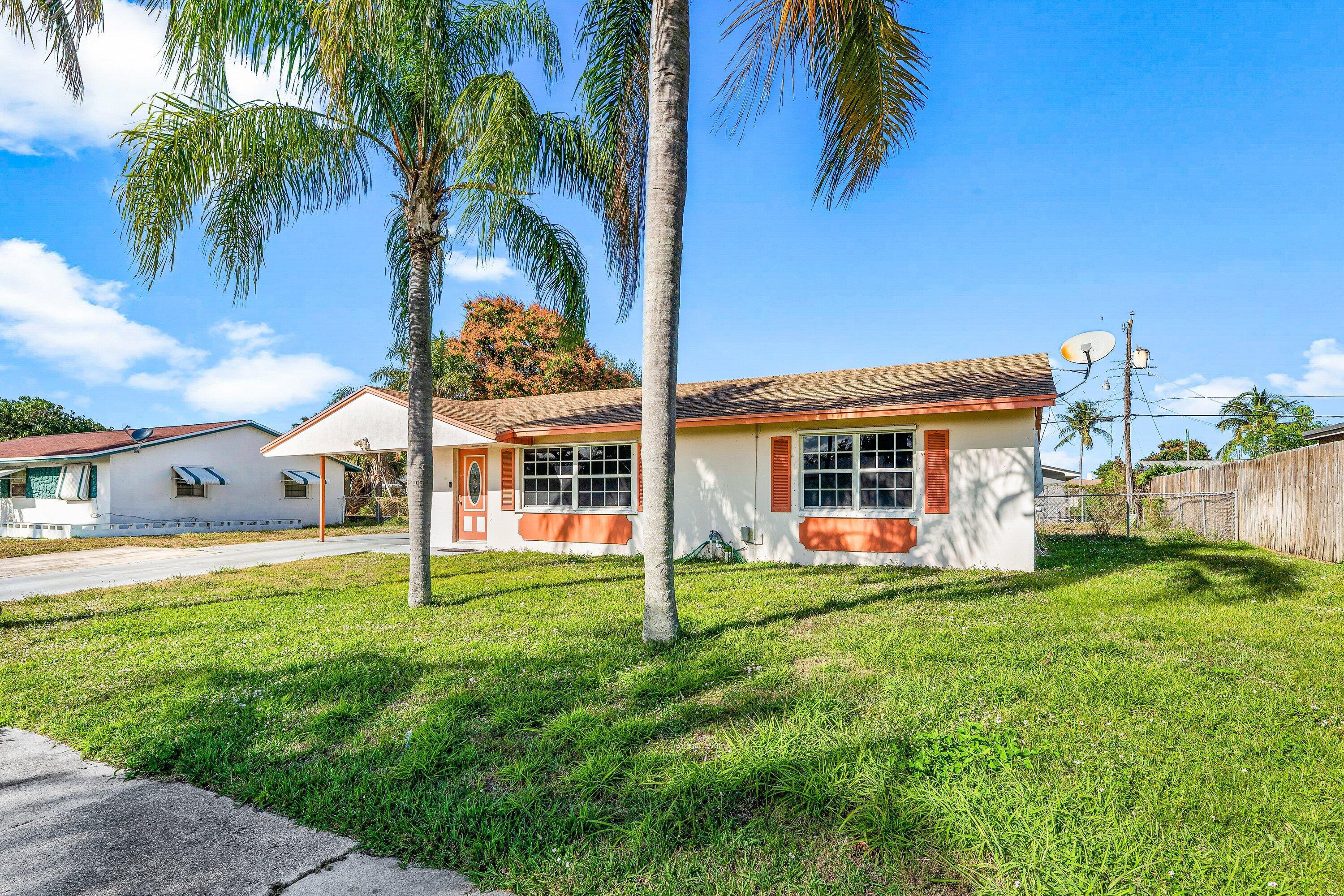 330 West 22nd Court Riviera Beach, FL 33404 - Photo 4 of 34 Front of the home
