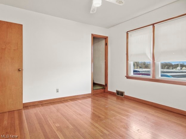 253 Wilson Street Struthers, OH 44471 - Photo 10 of 12 Spare room with light hardwood / wood-style floors and ceiling fan
