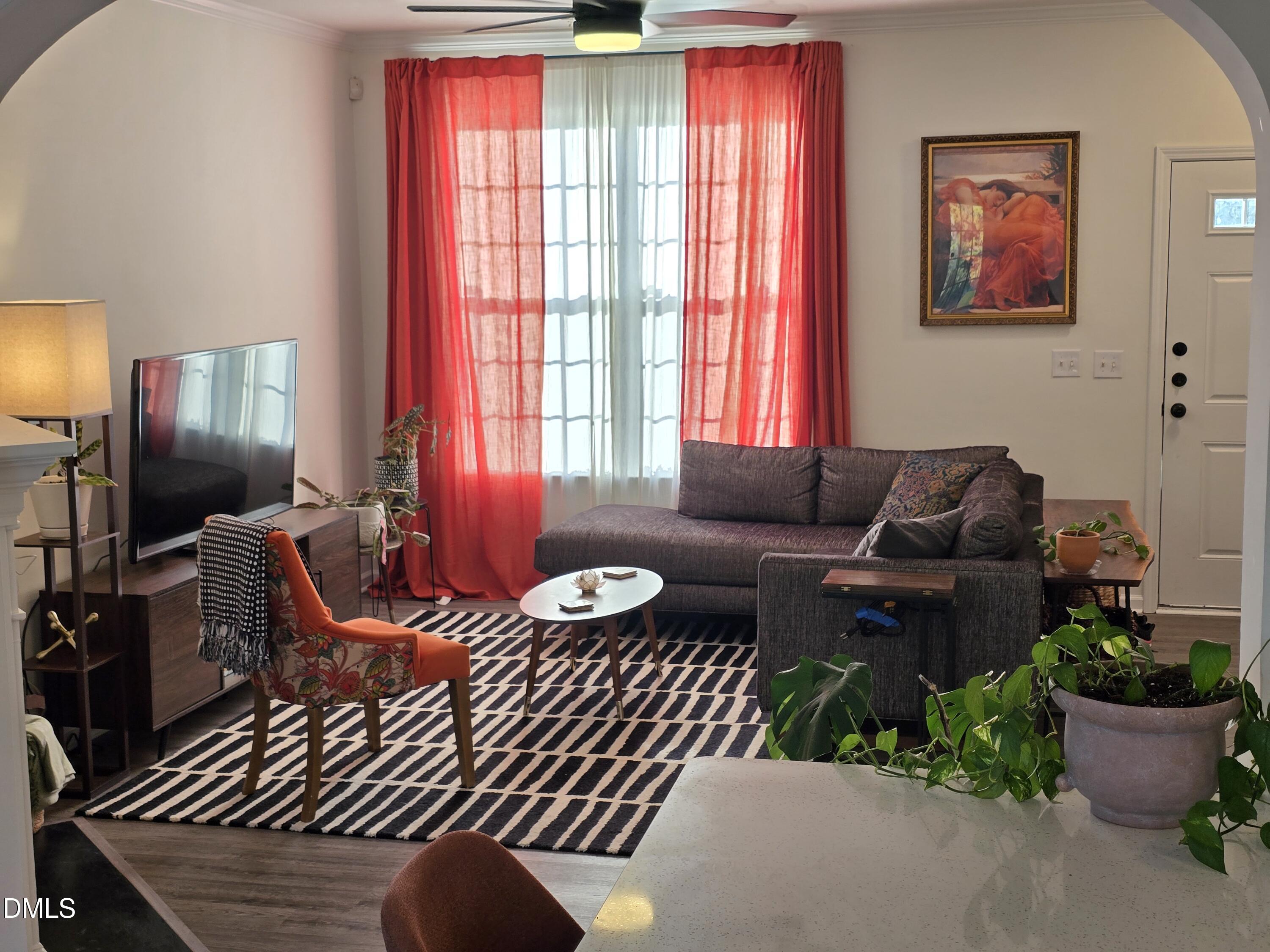 3617 Sugar Tree Place Durham, NC 27713 - Photo 18 of 38 a living room with furniture and a potted plant