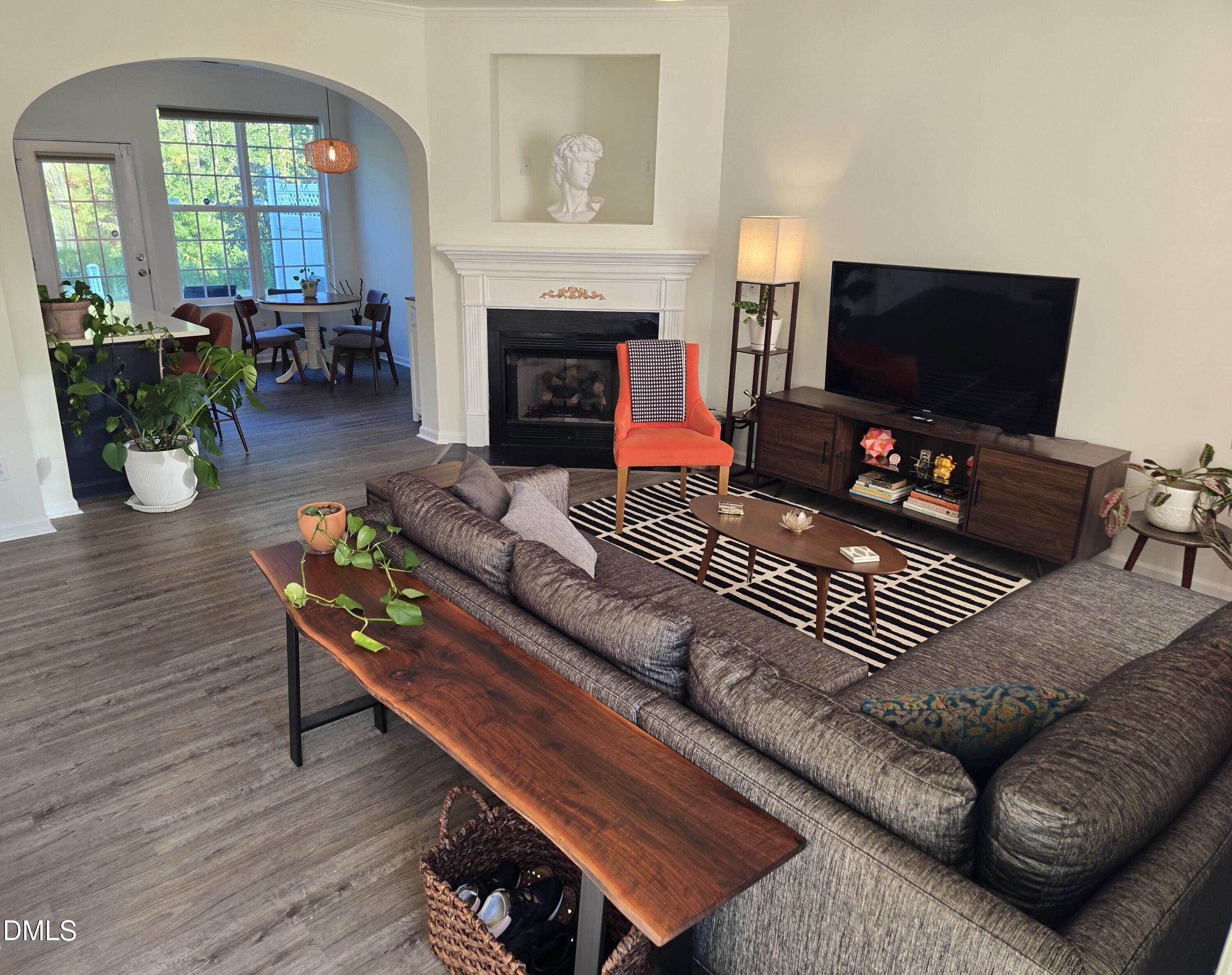 3617 Sugar Tree Place Durham, NC 27713 - Photo 20 of 38 a living room with furniture and a fireplace
