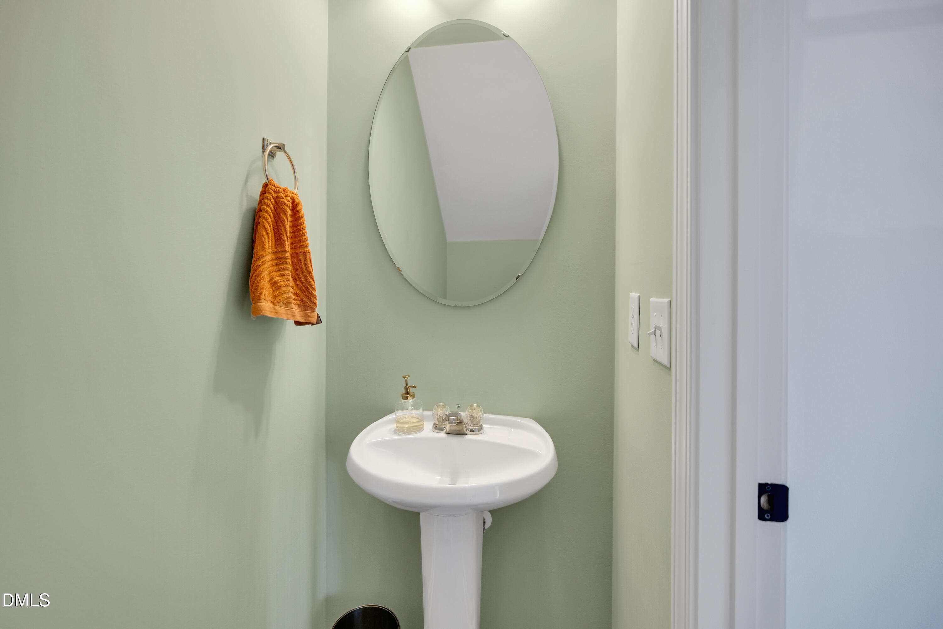 3617 Sugar Tree Place Durham, NC 27713 - Photo 21 of 38 a bathroom with a sink and a mirror
