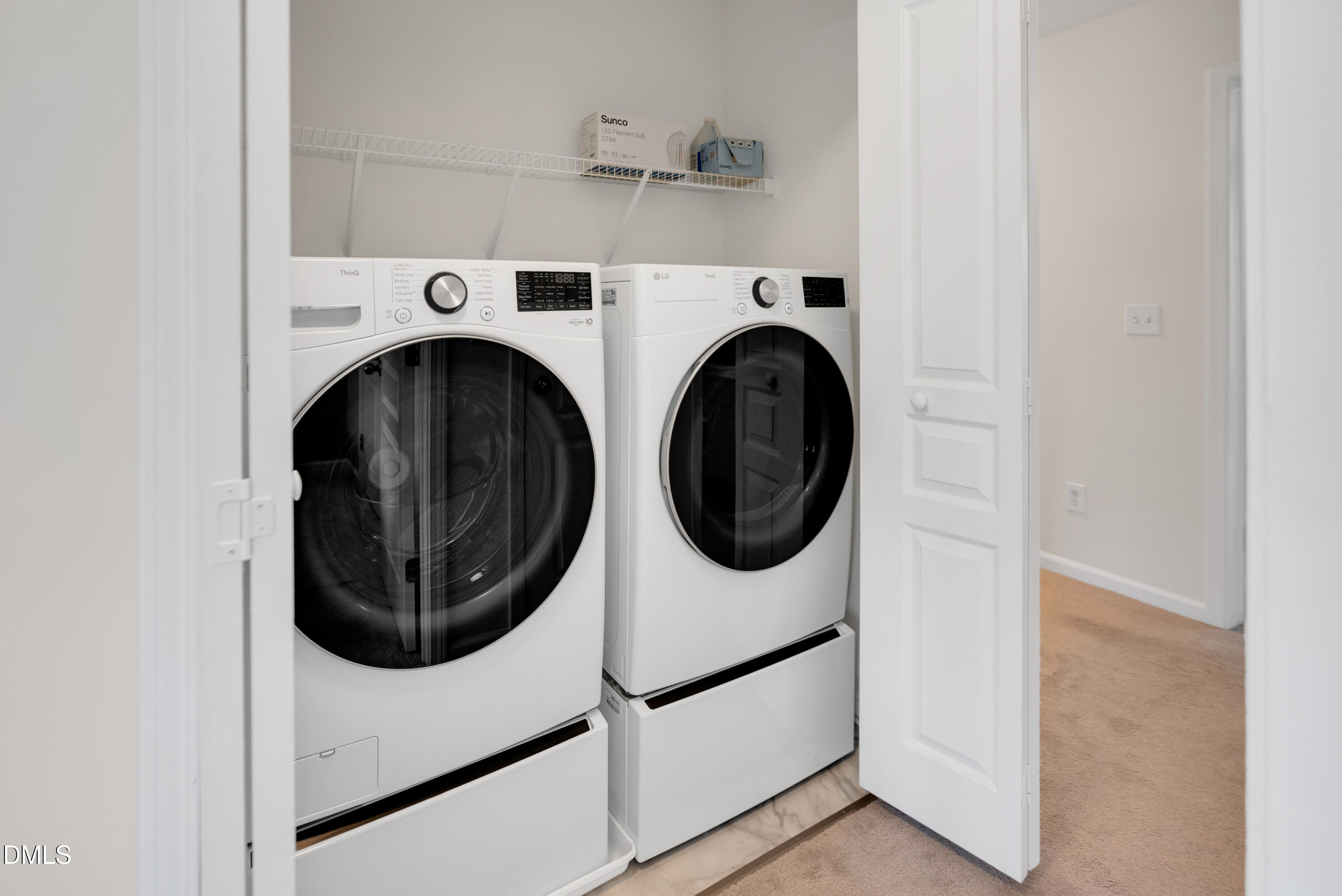 3617 Sugar Tree Place Durham, NC 27713 - Photo 34 of 38 a close up view of a washer and dryer