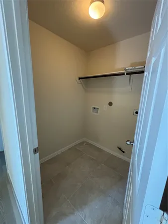 a bathroom with a double vanity sink a mirror and shower