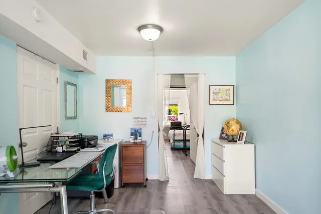 a view of a city with a lake