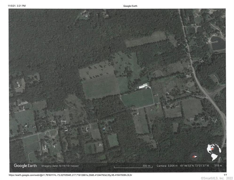 Google earth overview of the property and surrounding area. The white roofed barn is on Lot 1. The residence (126 Woodchuck Lane) sits to the left side of the property