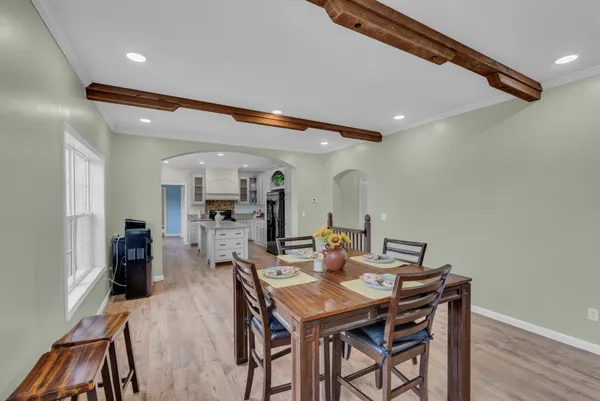 a view of a dining room with furniture