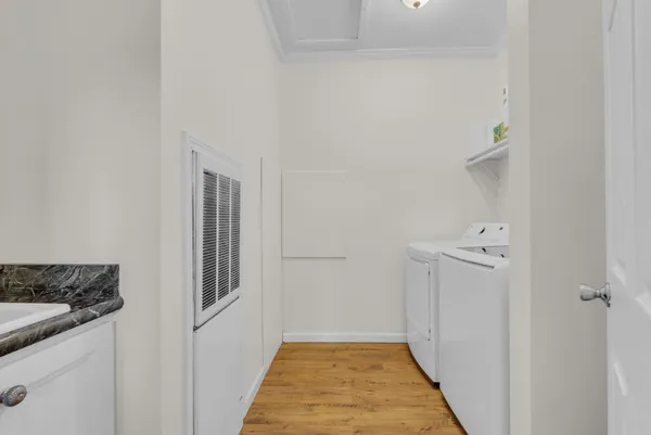 a view of a bathroom from the hallway