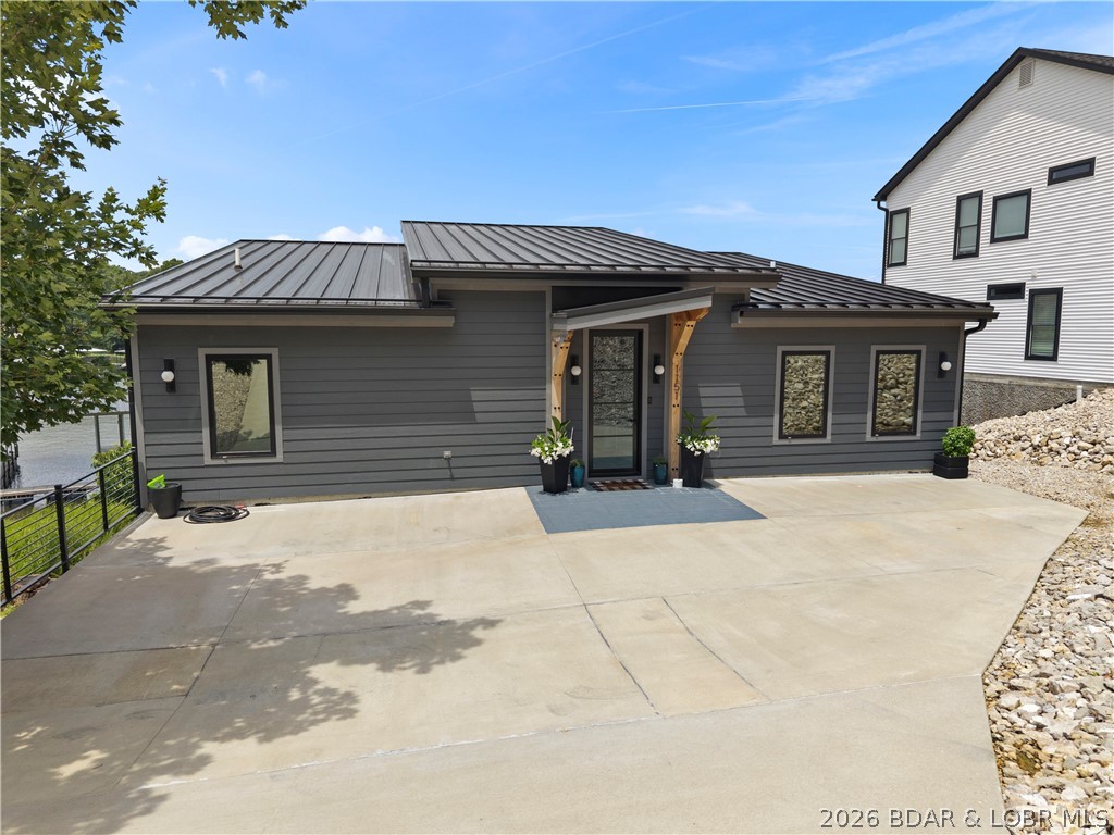 1151 Oak Road Osage Beach, MO 65065 - Photo 4 of 63 Contemporary exterior with clean architectural lin