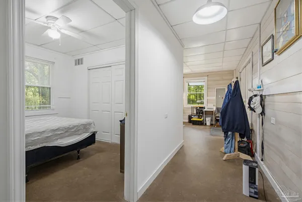 a room that has a bed and a window