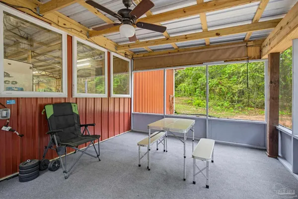 a room with furniture and a window