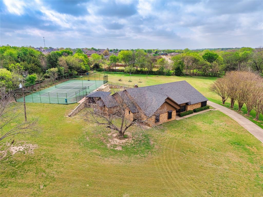 5840 Crystal Drive Midlothian, TX 76065 - Photo 1 of 36 a view of a lake with a yard