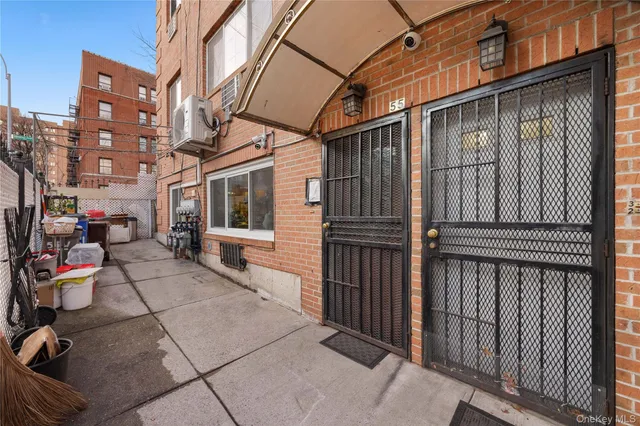 a front view of a house with a glass windows