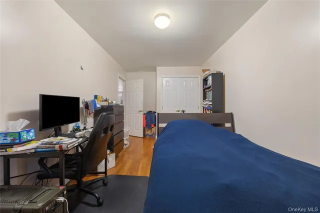 a room with furniture closet and wooden floor