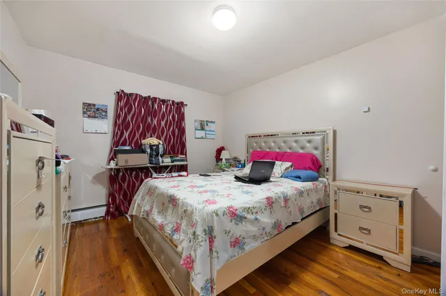 a bedroom with a bed and a table