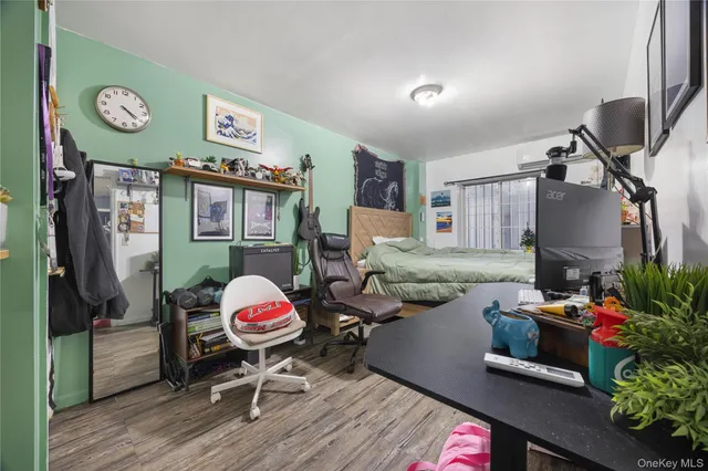 a bedroom with a bed and a table in it