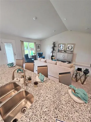 a room with furniture or couch and a window