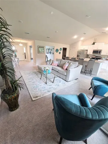 a living room with furniture and a couch