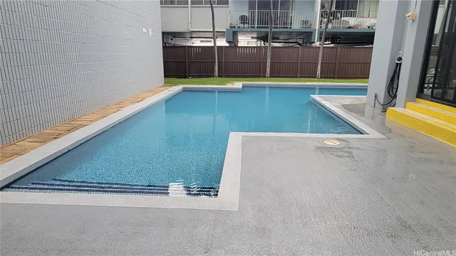 a view of parking space with parked cars