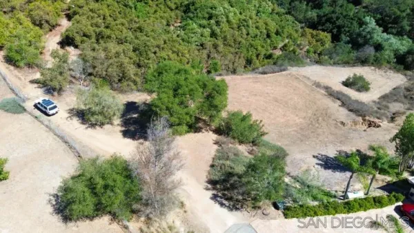 an aerial view of residential house with outdoor space
