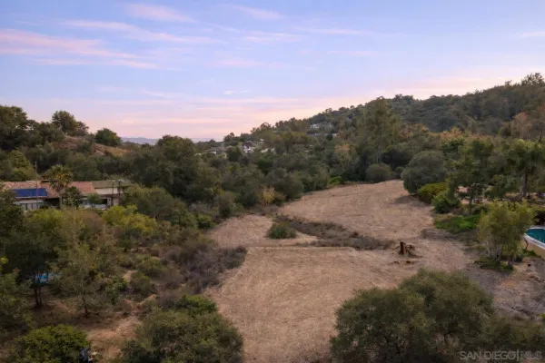 a view of a backyard of a house