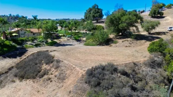 a view of a backyard of a house