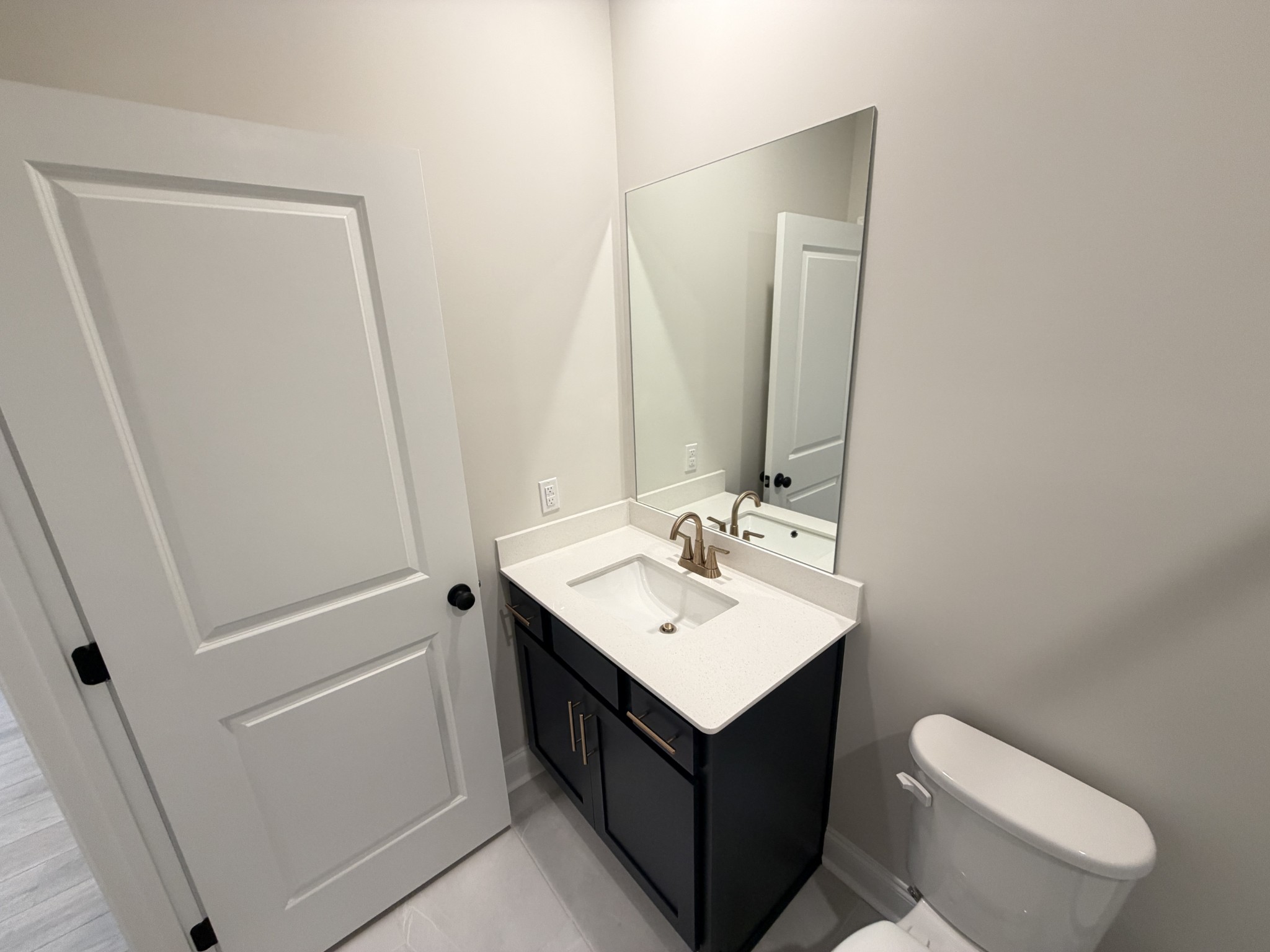 147 Emeline Way Mount Juliet, TN 37122 - Photo 15 of 41 a bathroom with a sink toilet and mirror