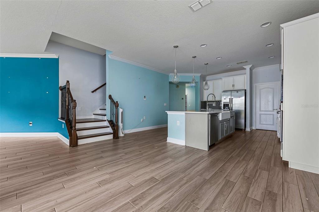 281 Ancona Avenue DeBary, FL 32713 - Photo 17 of 65 a view of a kitchen with furniture and wooden floor