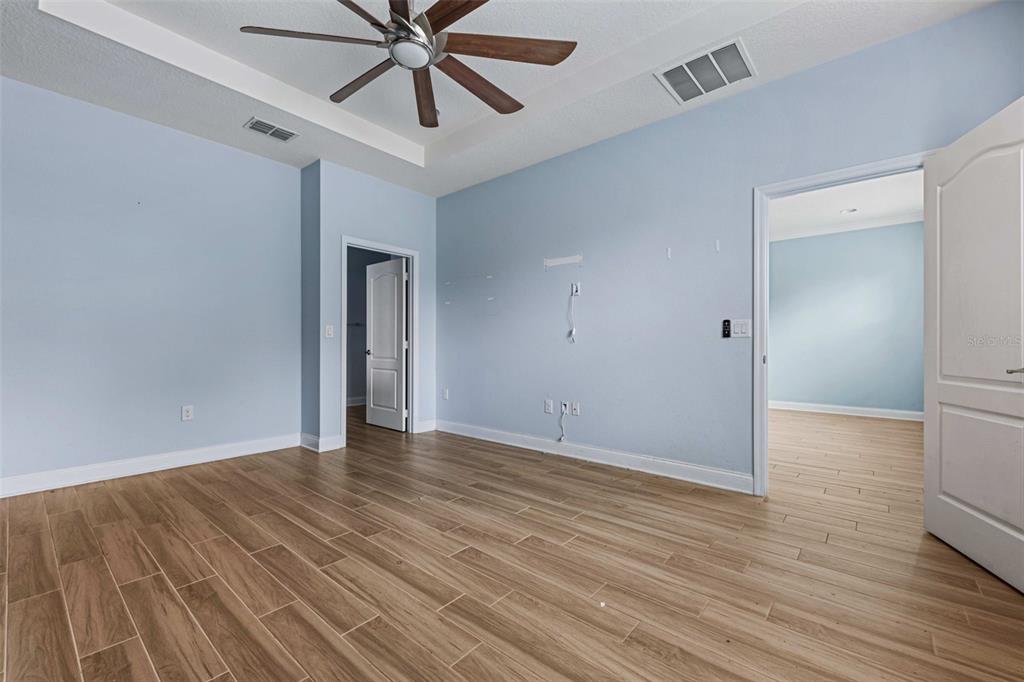 281 Ancona Avenue DeBary, FL 32713 - Photo 20 of 65 a view of an empty room and wooden floor