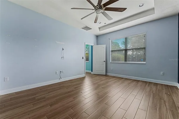a bathroom with a sink vanity and mirror