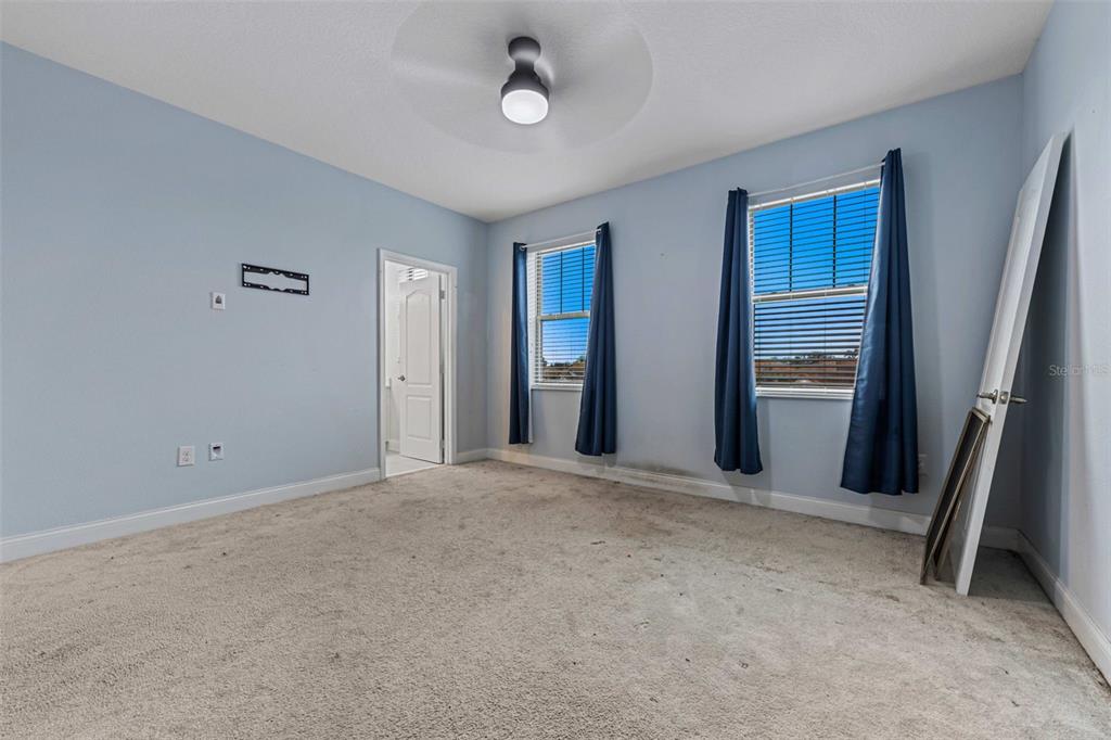 281 Ancona Avenue DeBary, FL 32713 - Photo 30 of 65 an empty room with closet and windows