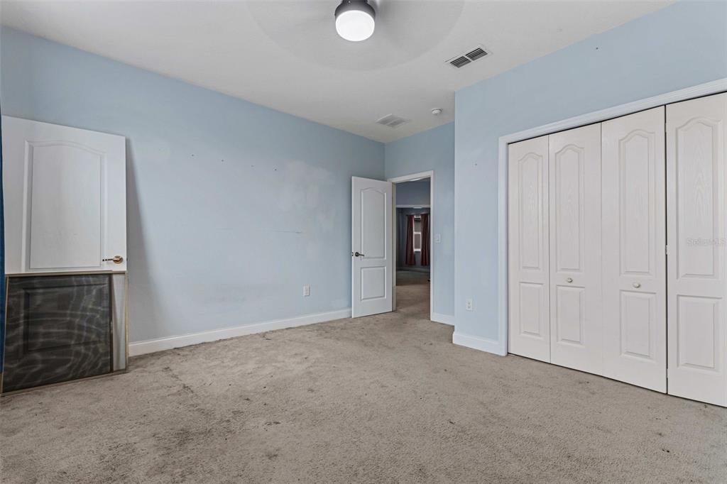 281 Ancona Avenue DeBary, FL 32713 - Photo 31 of 65 a view of an empty room with a fireplace