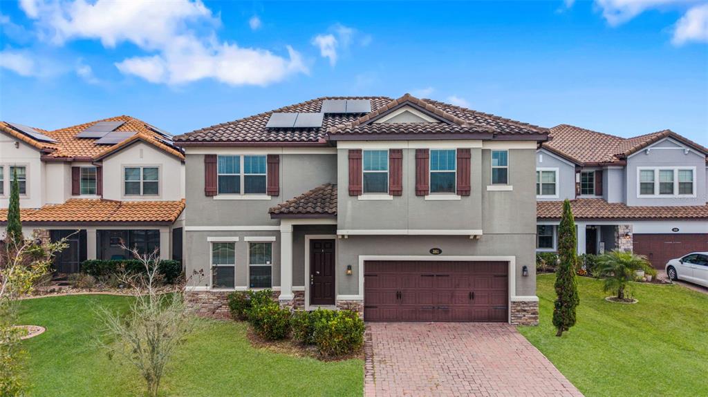 281 Ancona Avenue DeBary, FL 32713 - Photo 7 of 65 a front view of a house with a yard