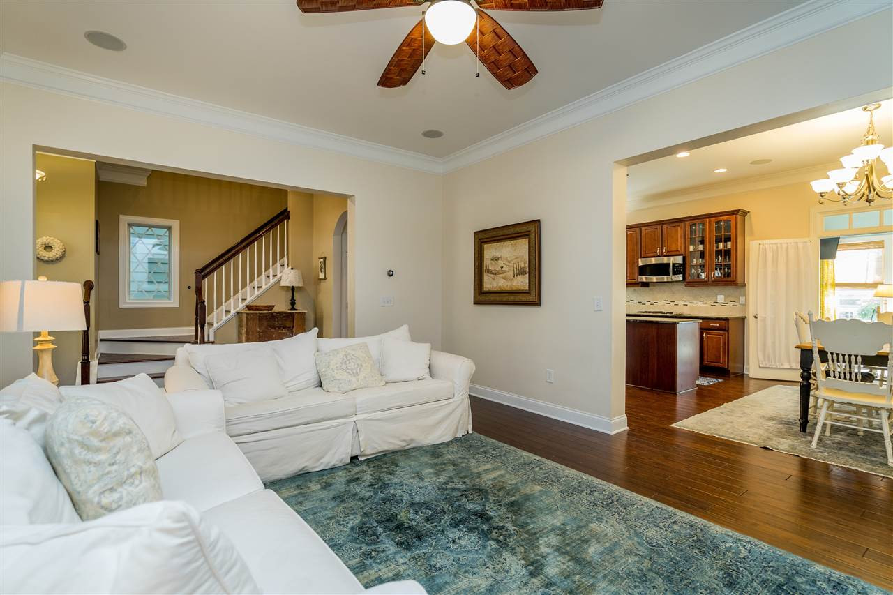 1528 Rodessa Run Raleigh, NC 27607 - Photo 10 of 30 Natural gas fireplace, custom cabinets, hardwoods, 10' ceilings and two piece crown molding. Living Room
