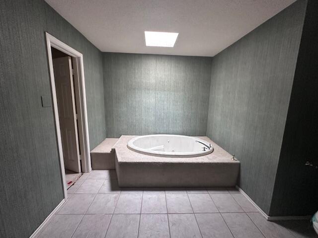 4610 91st Street Lubbock, TX 79424 - Photo 13 of 26 a bathroom with a bathtub