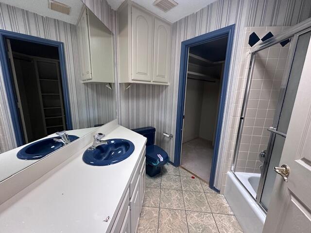 4610 91st Street Lubbock, TX 79424 - Photo 15 of 26 a bathroom with a sink and a shower