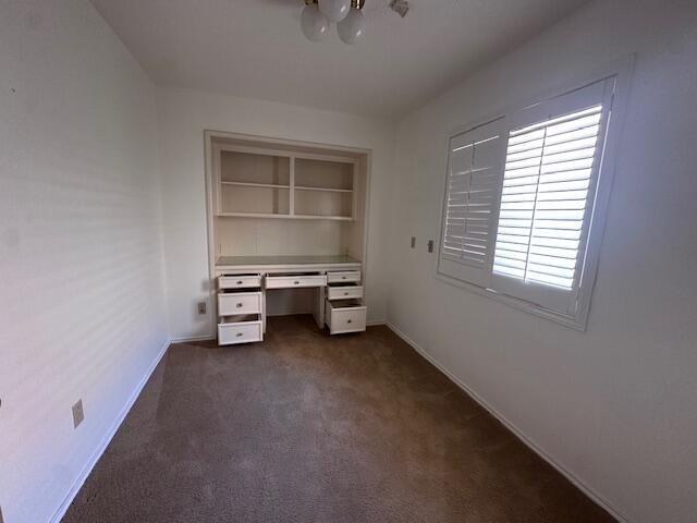 4610 91st Street Lubbock, TX 79424 - Photo 18 of 26 a view of a room with washing machine and cabinet