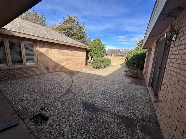 4610 91st Street Lubbock, TX 79424 - Photo 20 of 26 a backyard of a house