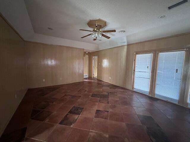 4610 91st Street Lubbock, TX 79424 - Photo 7 of 26 a view of a livingroom with a ceiling fan and window