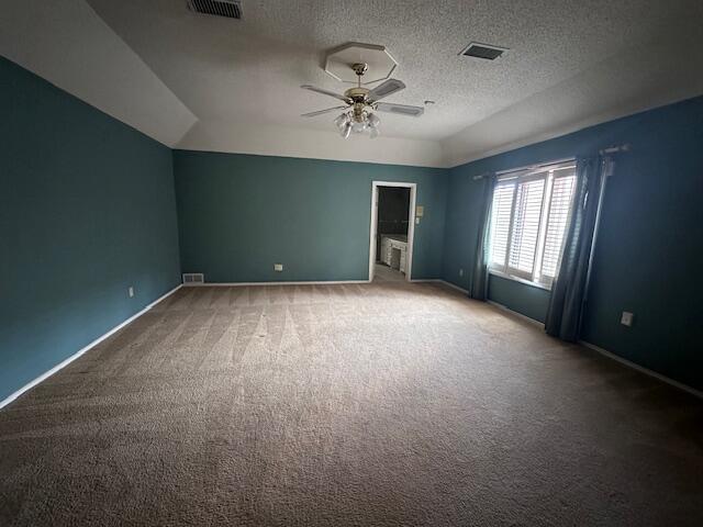 4610 91st Street Lubbock, TX 79424 - Photo 9 of 26 en empty room with windows and ceiling fan