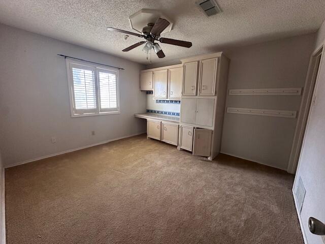 4610 91st Street Lubbock, TX 79424 - Photo 10 of 26 a view of an empty room with a window