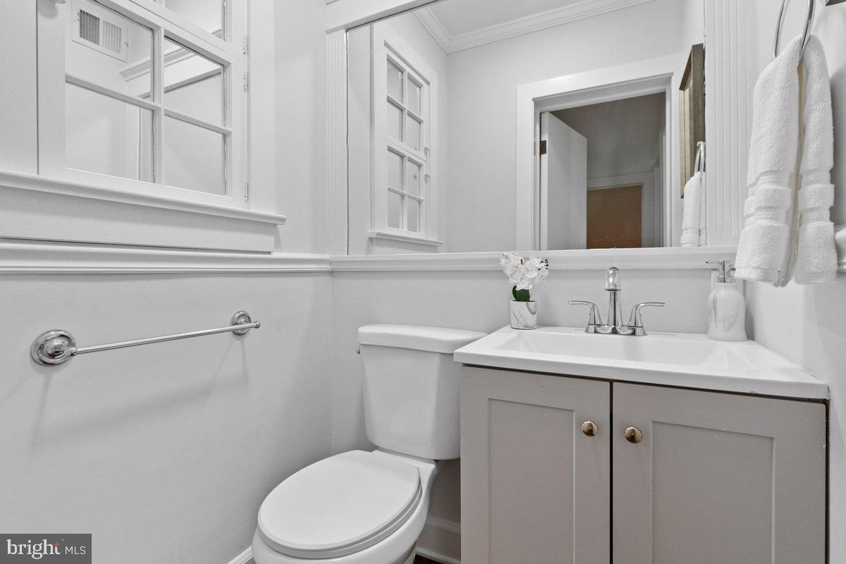 122 Linden Lane Princeton, NJ 08540 - Photo 12 of 19 a bathroom with a toilet sink and mirror