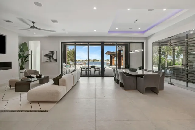 a kitchen with stainless steel appliances white cabinets and a sink
