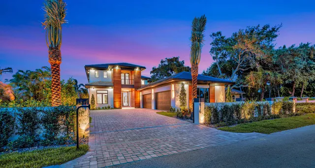 a view of swimming pool with outdoor seating