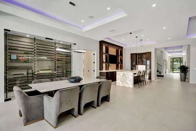 a spacious bathroom with a glass shower door and a window
