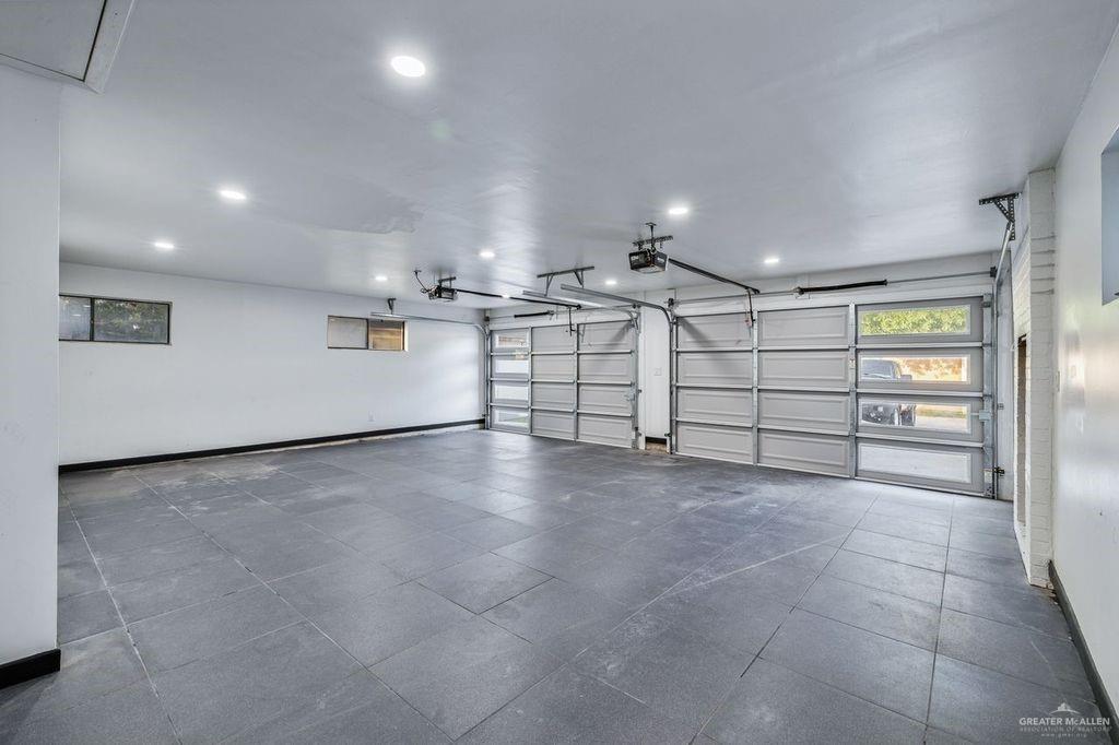 111 South Cox Street Rio Grande City, TX 78582 - Photo 14 of 27 Garage featuring baseboards and recessed lighting