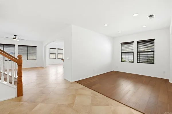 a view of empty room with windows