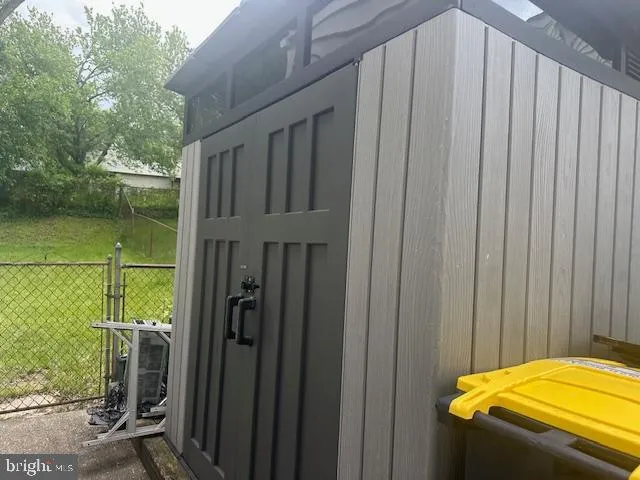 a view of a balcony with washer and dryer